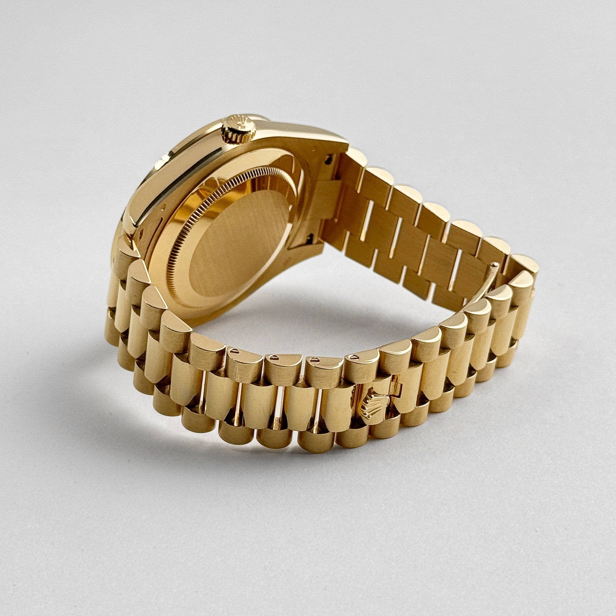 Rolex Day-Date II 218398 Yellow Gold Champagne Ruby Dial Diamond Bezel (2010)