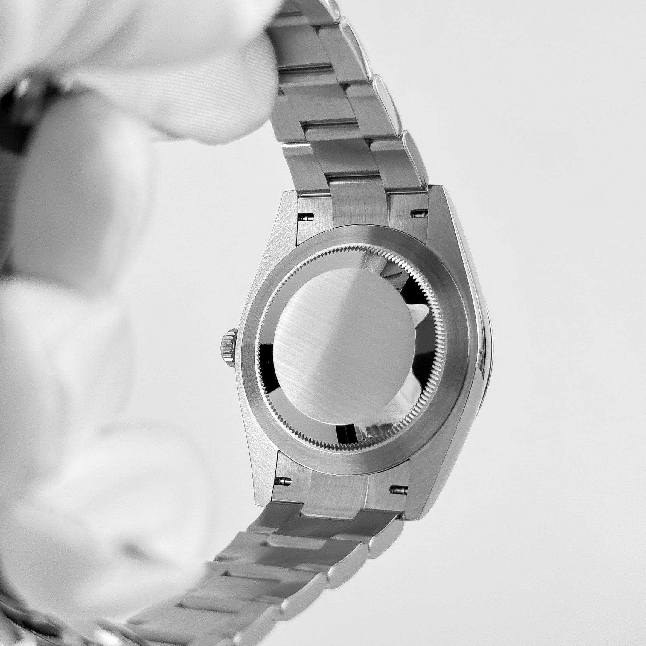 Rolex Oyster Perpetual 41 124300 Stainless Steel Coral Red Dial (2021)