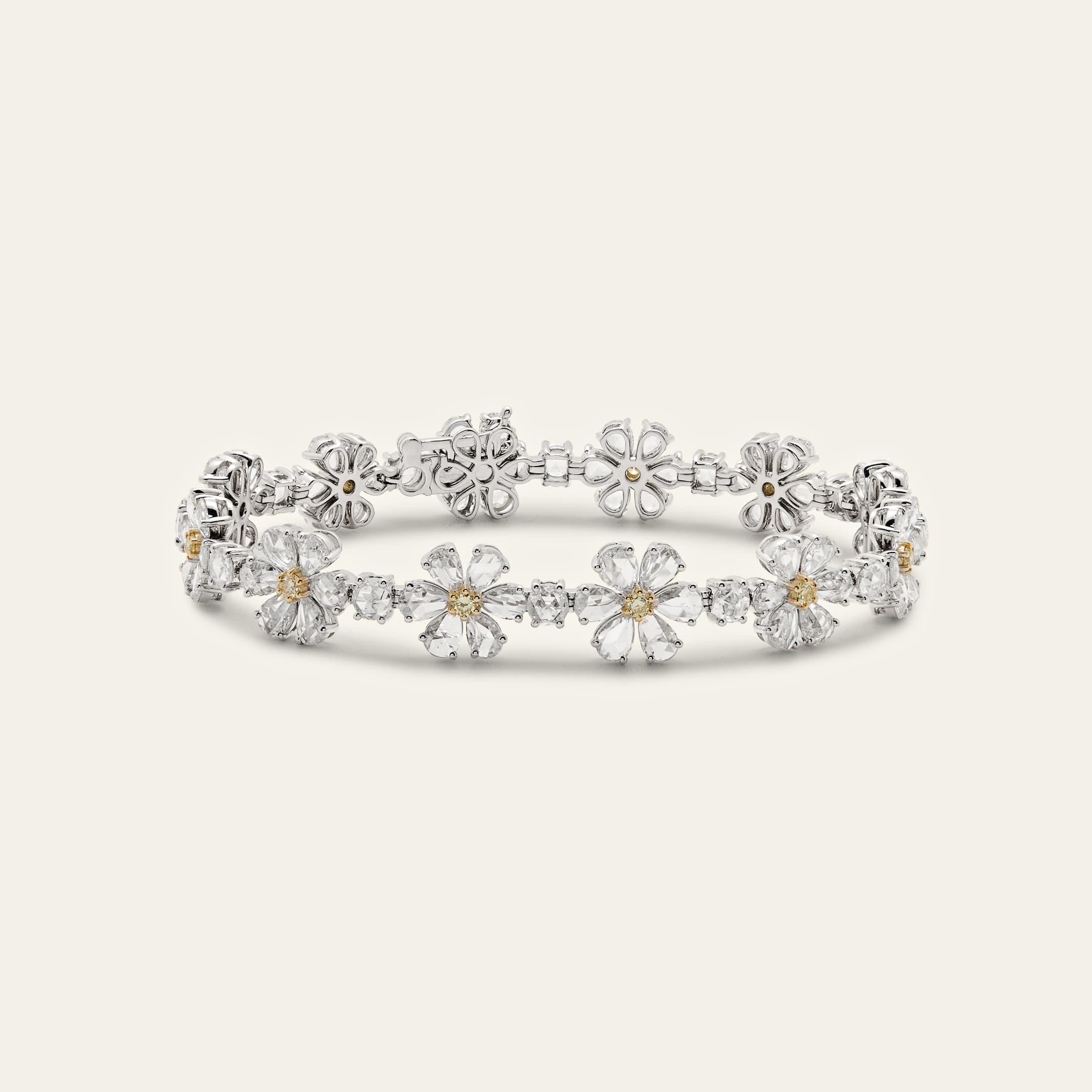 rose-cut-diamond-flower-bracelet-jewels-aficionado-1246438687.jpg