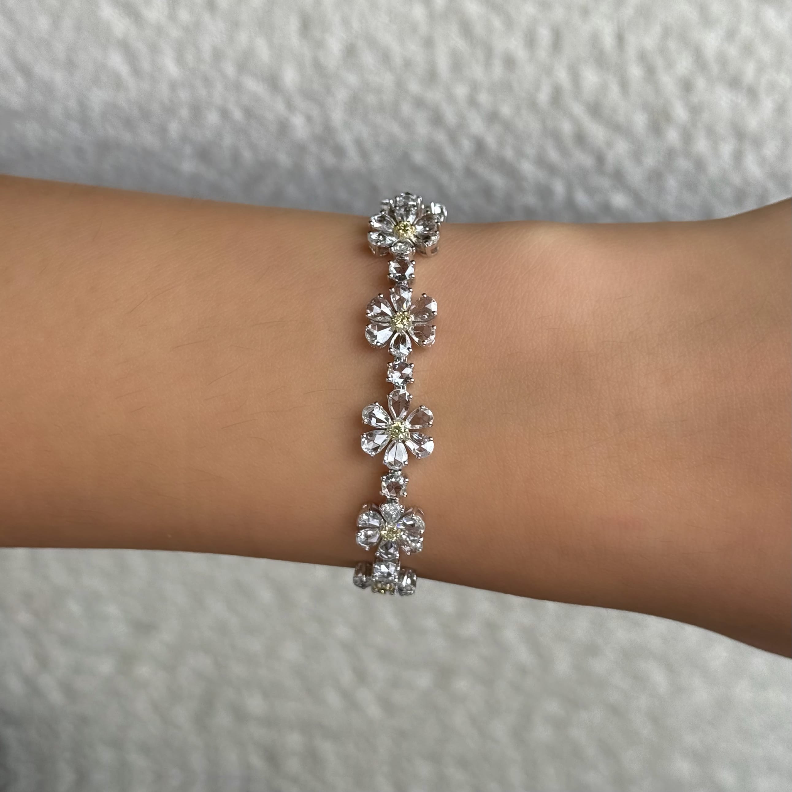rose-cut-diamond-flower-bracelet-jewels-aficionado-1246534153.jpg