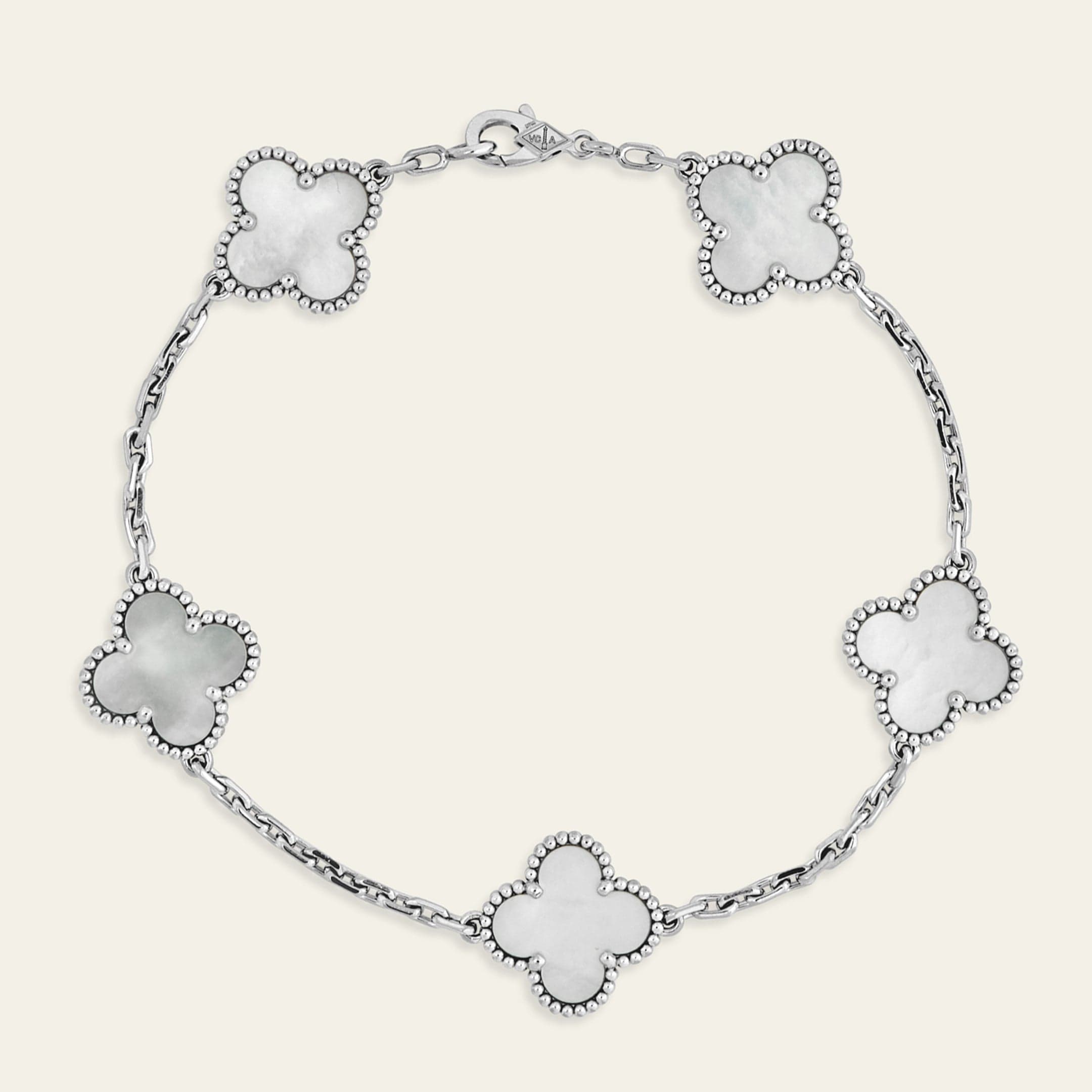 van-cleef-arpels-vintage-alhambra-bracelet-5-motifs-white-mother-of-pearl-van-cleef-arpels-1154322032.jpg