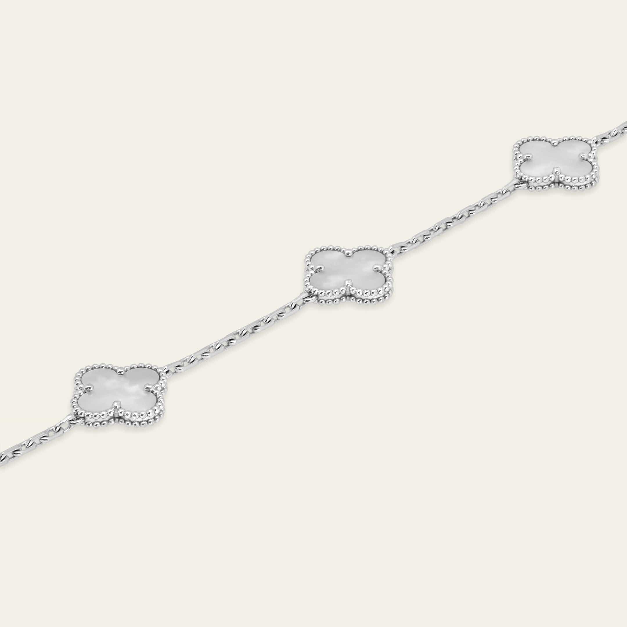 van-cleef-arpels-vintage-alhambra-bracelet-5-motifs-white-mother-of-pearl-van-cleef-arpels-1154322033.jpg