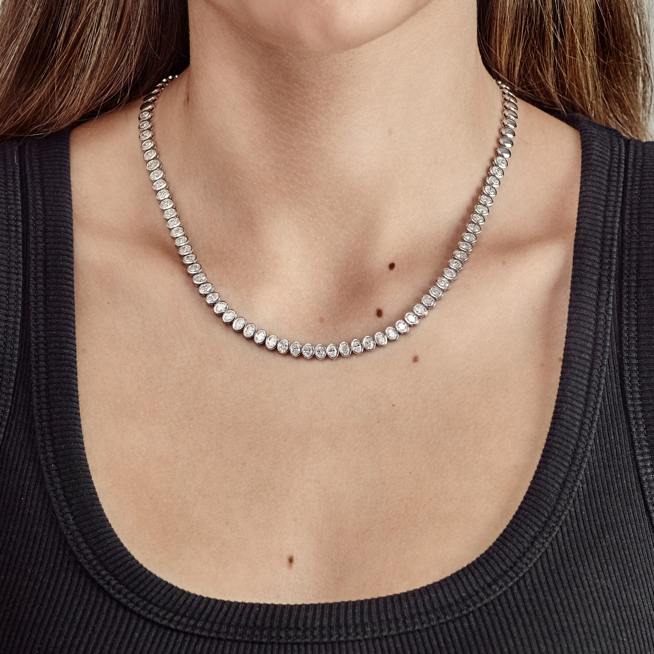 white-gold-bezel-set-oval-diamond-tennis-necklace-jewels-aficionado-1192988234.jpg