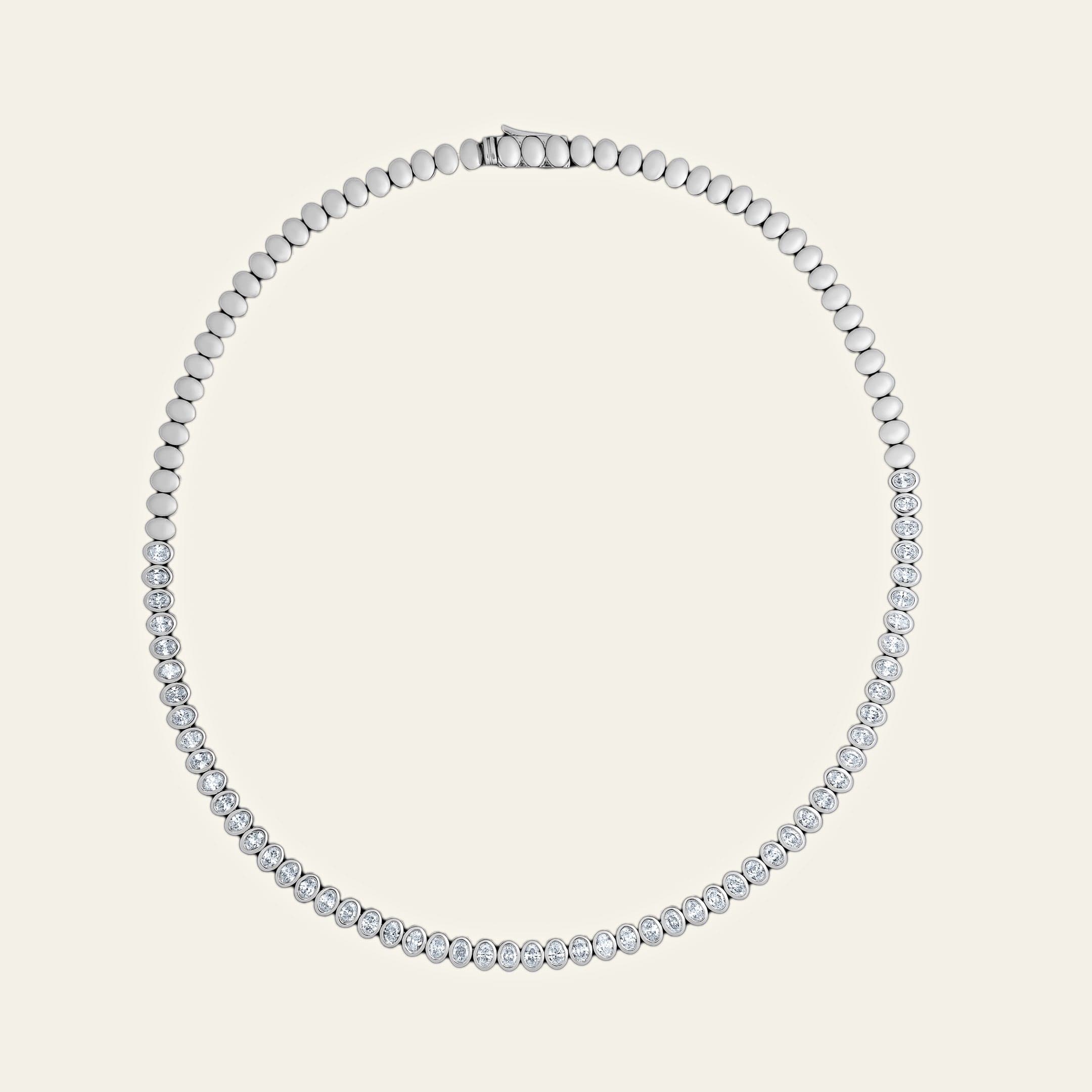 white-gold-bezel-set-oval-diamond-tennis-necklace-jewels-aficionado-1192988235.jpg