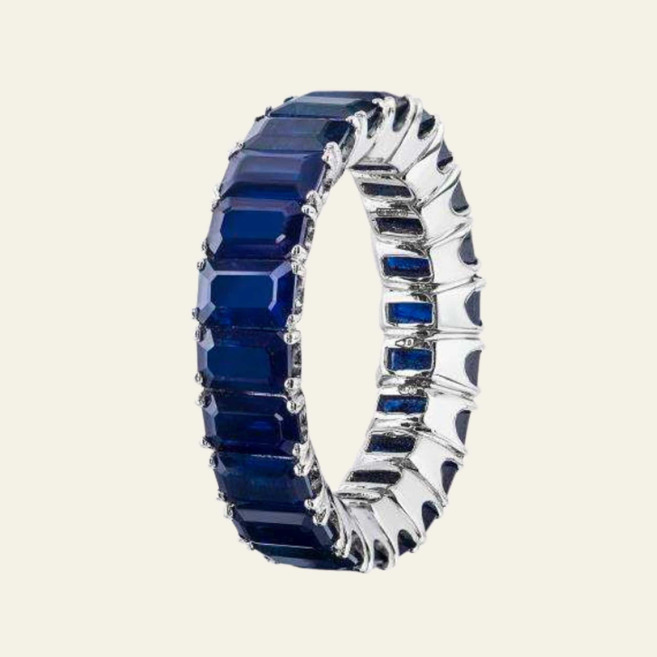 white-gold-blue-sapphire-ring-jewels-aficionado-1217900070.jpg