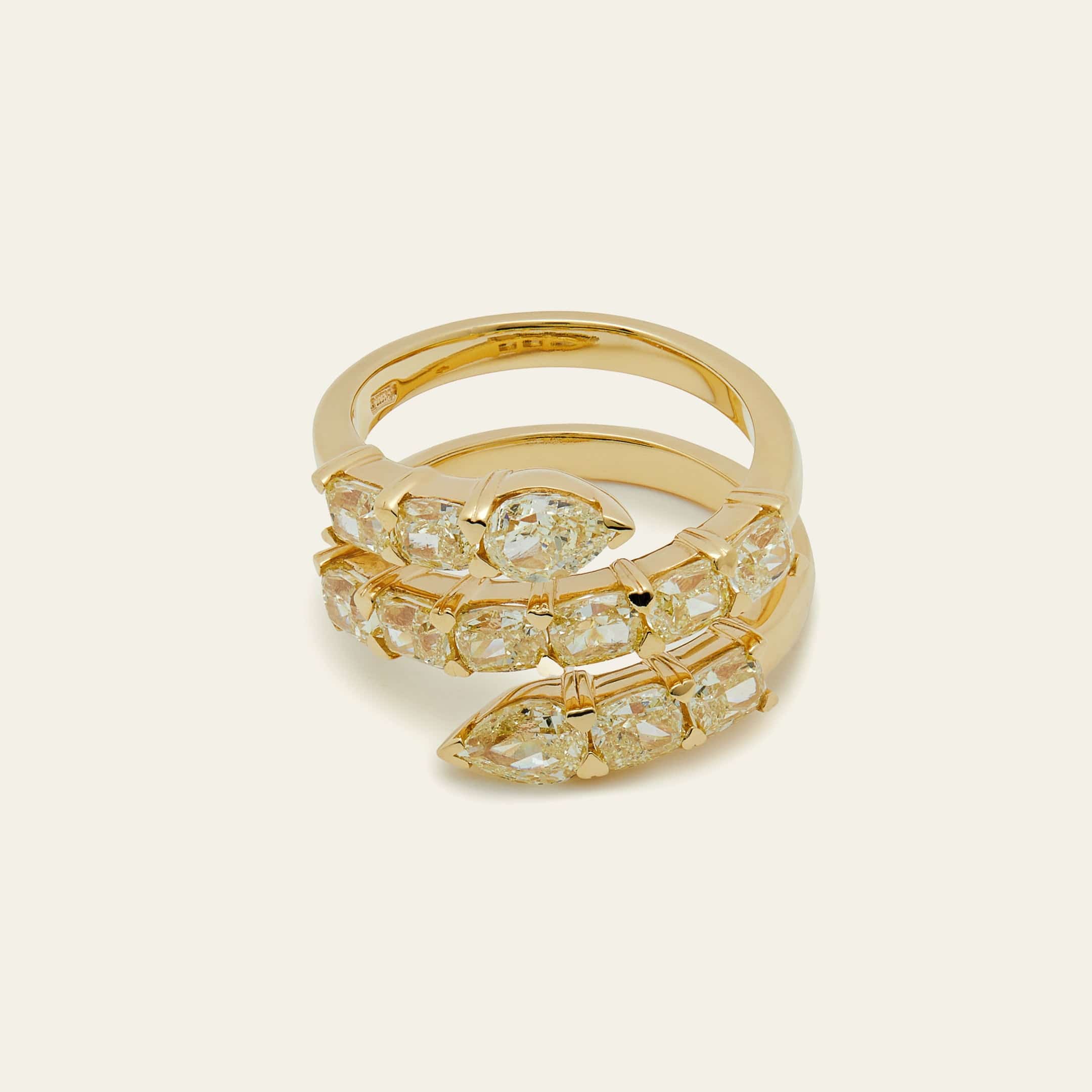 yellow-diamond-twist-ring-jewels-aficionado-1146591767.jpg