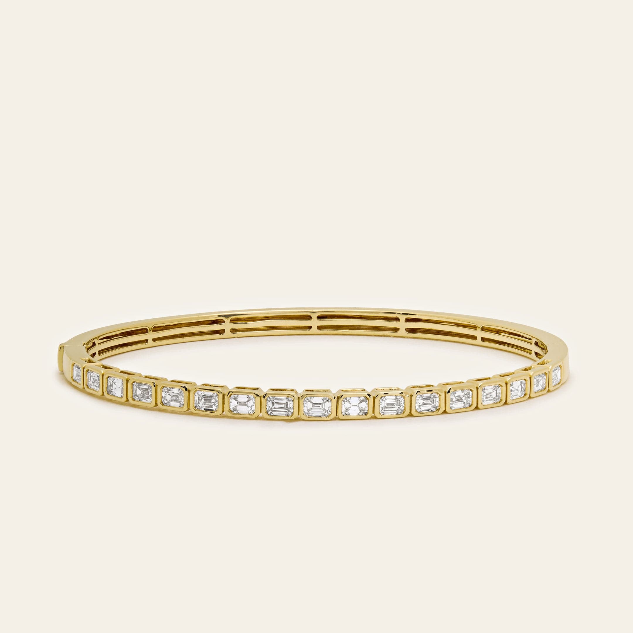 yellow-gold-bezel-set-diamond-bangle-jewels-aficionado-1191884871.jpg
